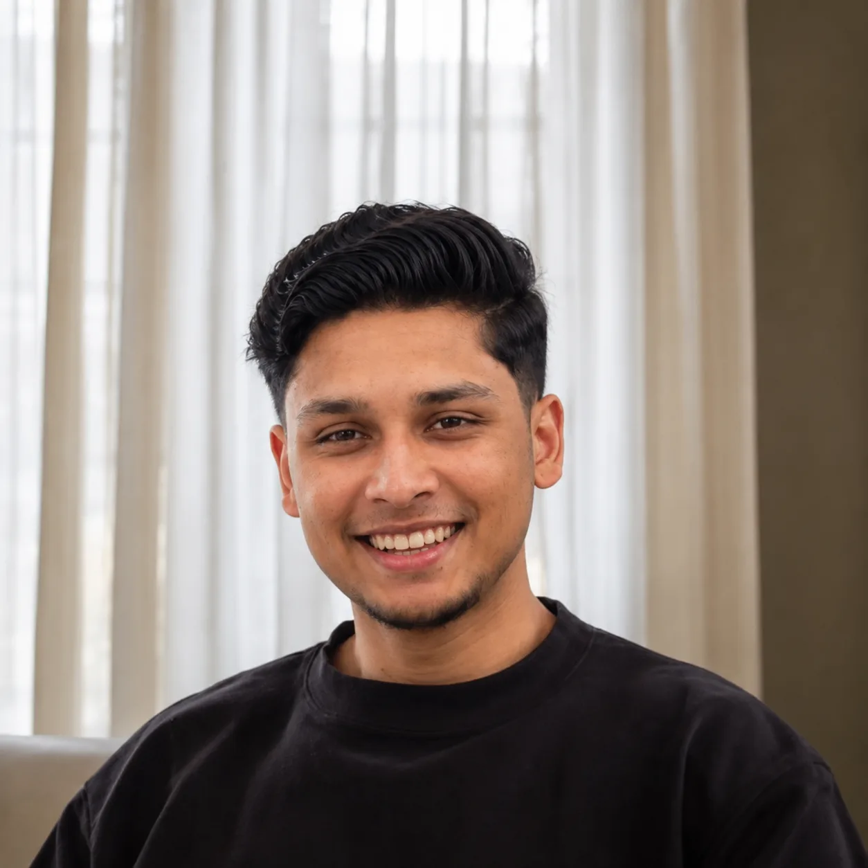 Portrait of M.Maaz smiling