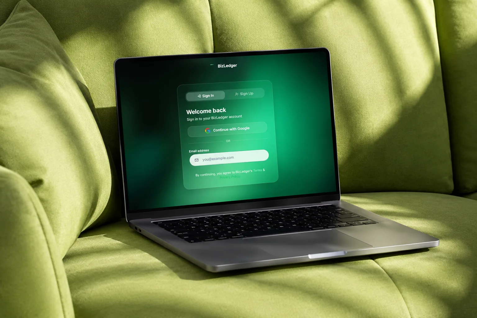BizLedger sign in screen on laptop